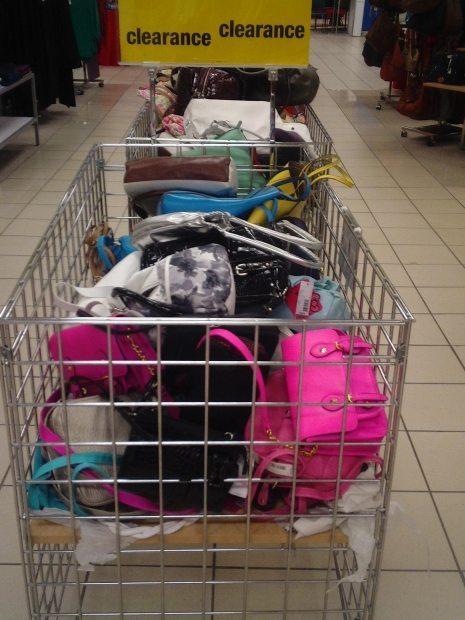 Full shopping cart of clothes