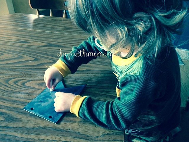 adorable toddler coloring with chalk