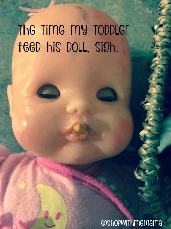 doll with food is her mouth