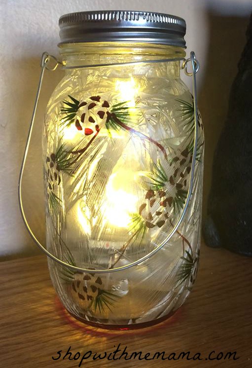 light up Christmas mason jar with pine cones