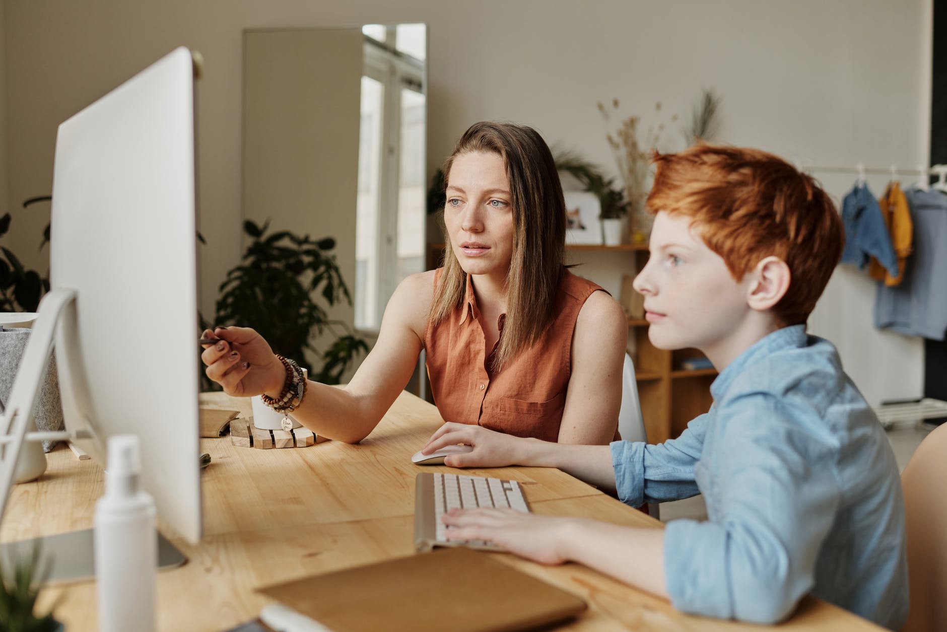 parent and child on computer