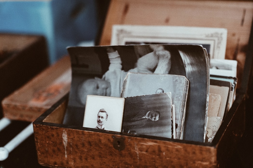 old pictures in a wooden box