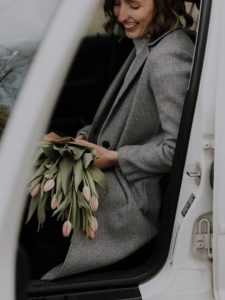 cropped-woman-holding-tulips.jpg