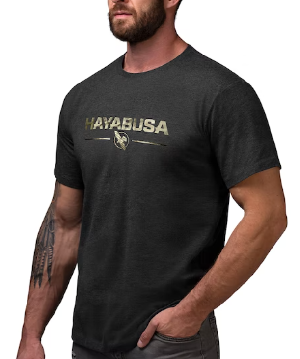 Hayabusa Classic Logo T-Shirt: Make a statement. Represent Hayabusa with the classic logo tee. Made with ultra soft midweight blended fabric for a comfortable relaxed fit. It’s the shirt you reach for no matter where you’re headed. Ultra soft blended fabric Custom Hayabusa graphic Relaxed fit with a classic crewneck Lightweight materials